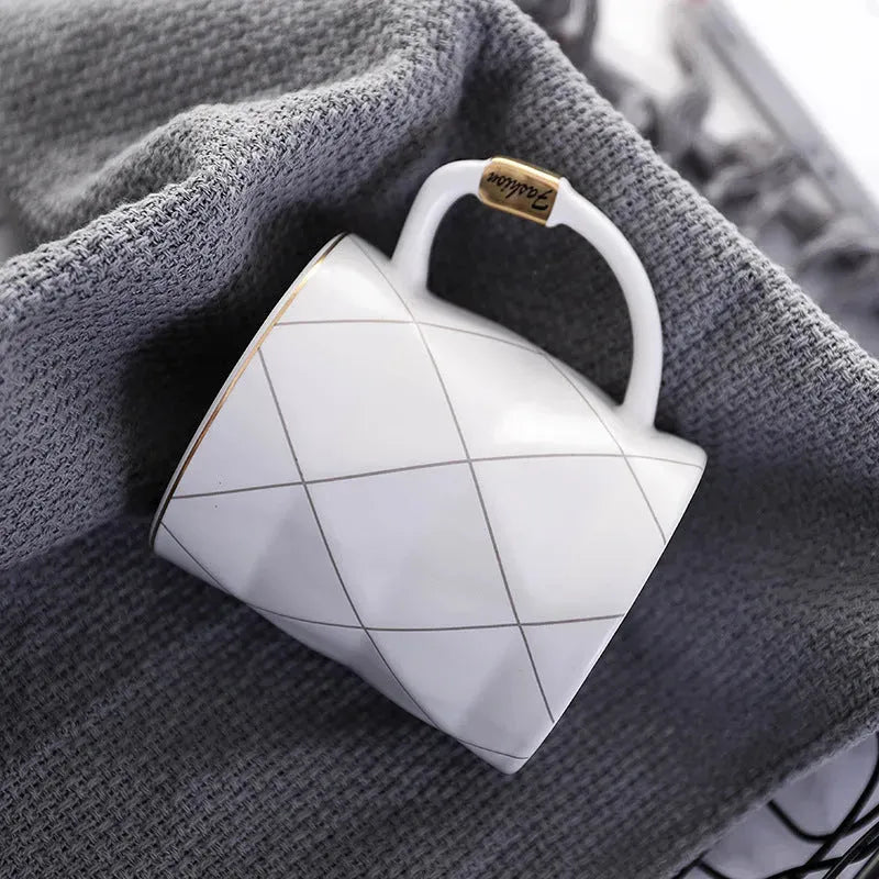 Gold painted black and white lattice ceramic cup - Bellarte Enchanté Gold painted black and white lattice ceramic cup